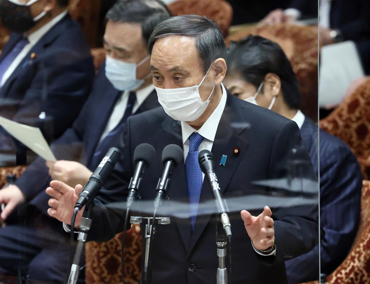 衆院予算委員会で答弁する菅義偉首相=22日午前、国会・衆院第1委員室(春名中撮影)