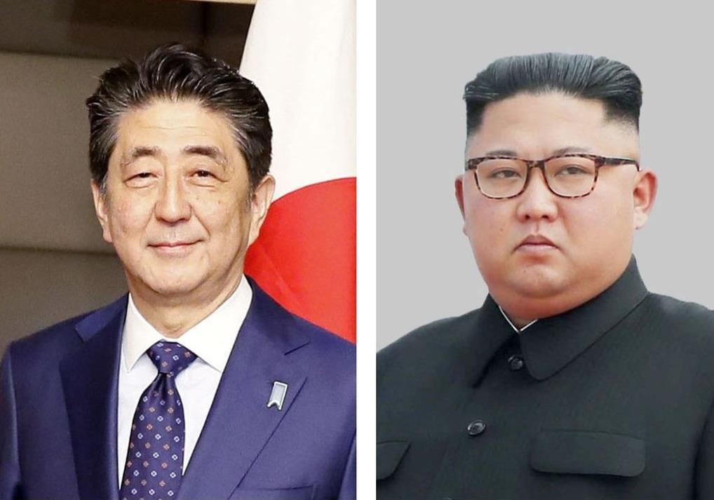 (左から)安倍晋三首相、北朝鮮の金正恩朝鮮労働党委員長