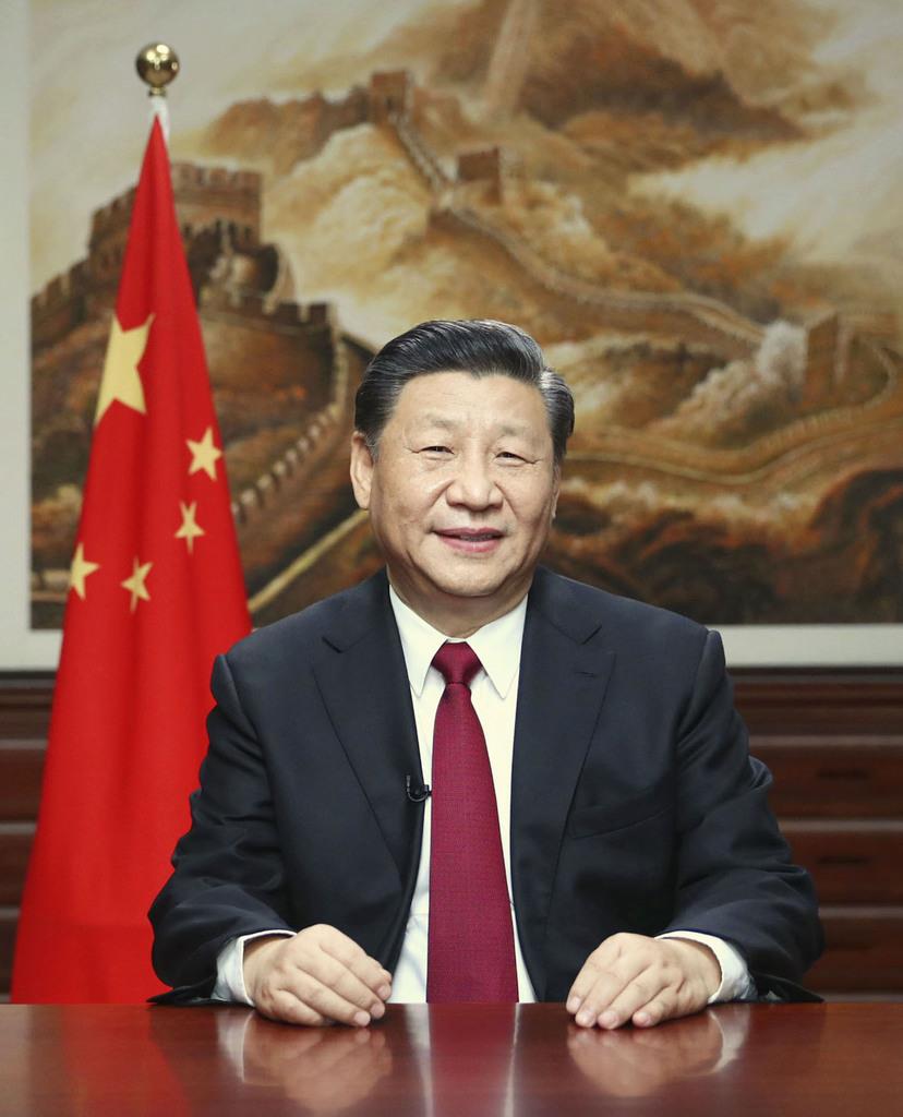 新年のあいさつを発表する中国の習近平国家主席(新華社=共同)